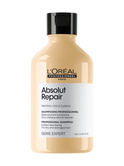 Botella de champú Absolut Repair 300 ml sobre fondo blanco