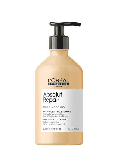 Botella de champú Absolut Repair 500 ml sobre fondo blanco
