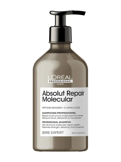 Botella grande de champú Absolut Repair Molecular sobre fondo blanco