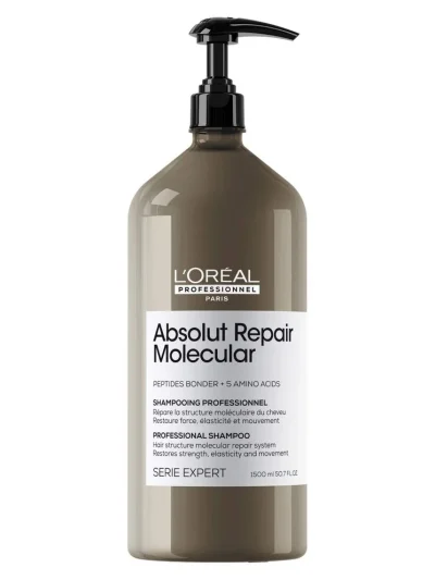 Botella grande de champú Absolut Repair Molecular sobre fondo blanco